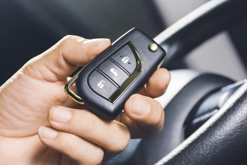 Why do modern car keys need to be programmed?